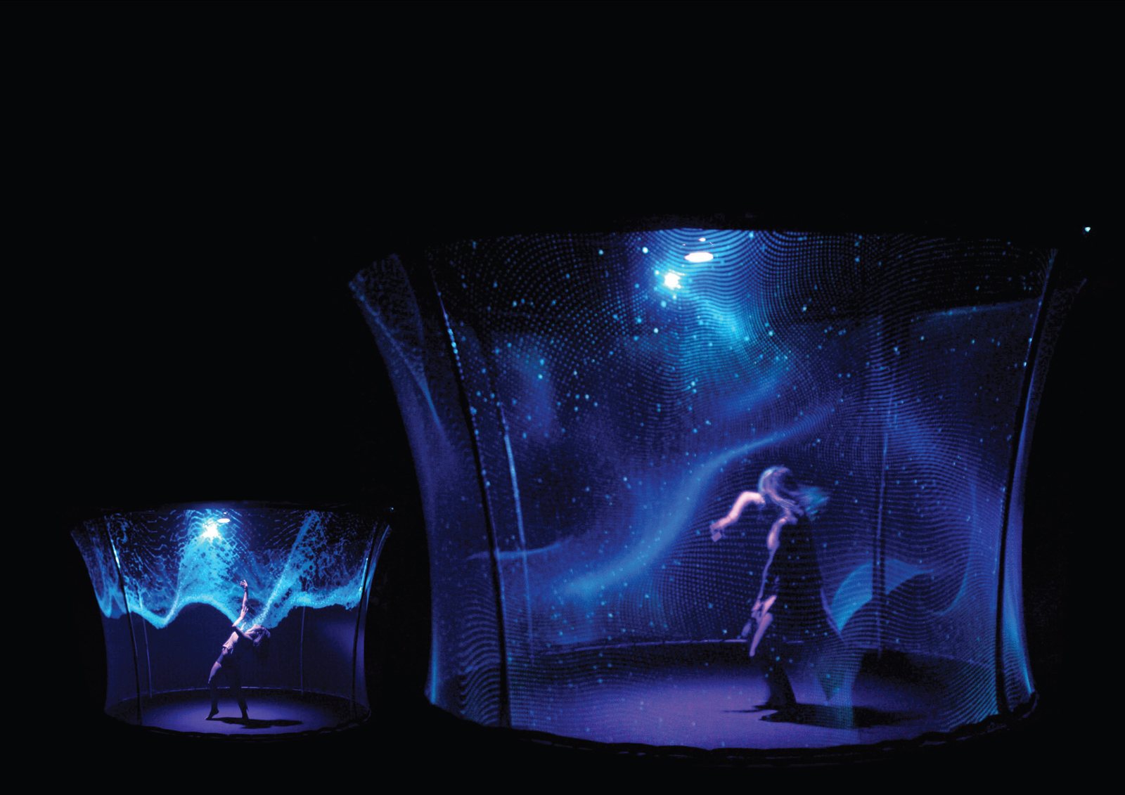 A performer inside an angular projected stage environment